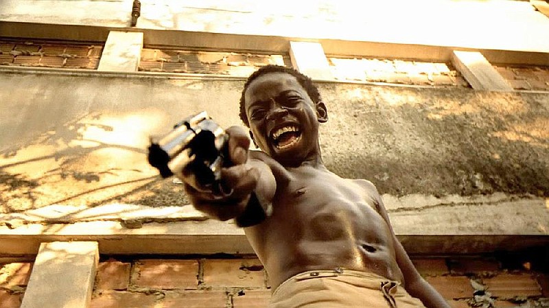 Lil’ Dice (Douglas Silva) is determined to be the baddest gangster in the favela in the Brazilian coming-of-age drama City of God.
