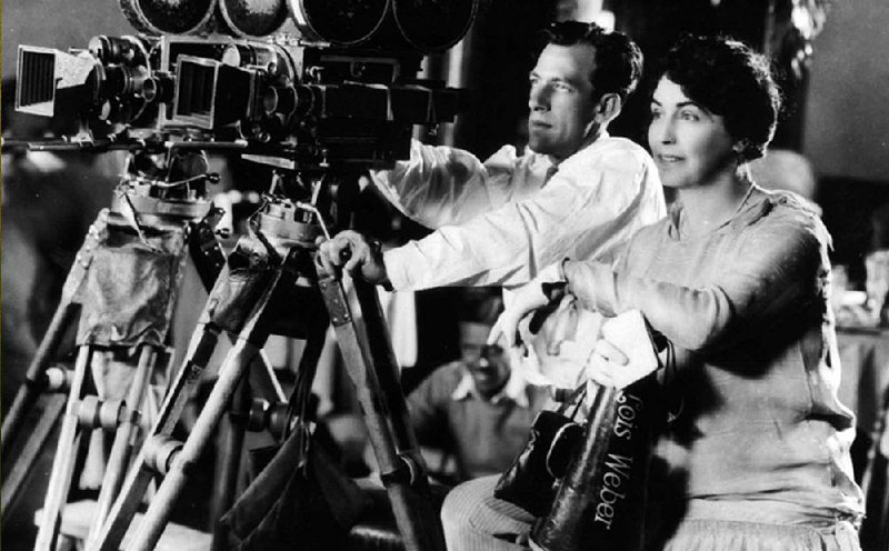 Lois Weber, seen here with an unidentified cameraman, was not only the leading female director-screenwriter in Hollywood silent era, she was arguably the most important and prolific filmmaker of her time.