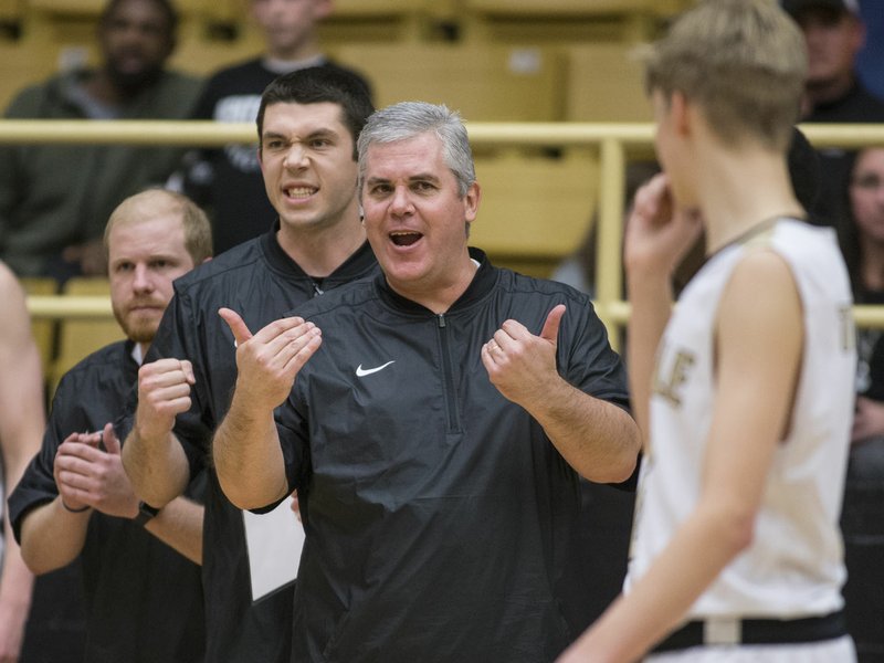 NWA Democrat-Gazette/BEN GOFF @NWABENGOFF Dick Rippee, Bentonville High boys basketball coach, reacts after Bentonville defeated Springdale earlier this season. The Tigers will travel to Springdale Har-Ber tonight in a key 7A-West game. Har-Ber defeated Bentonville in the first meeting this season.