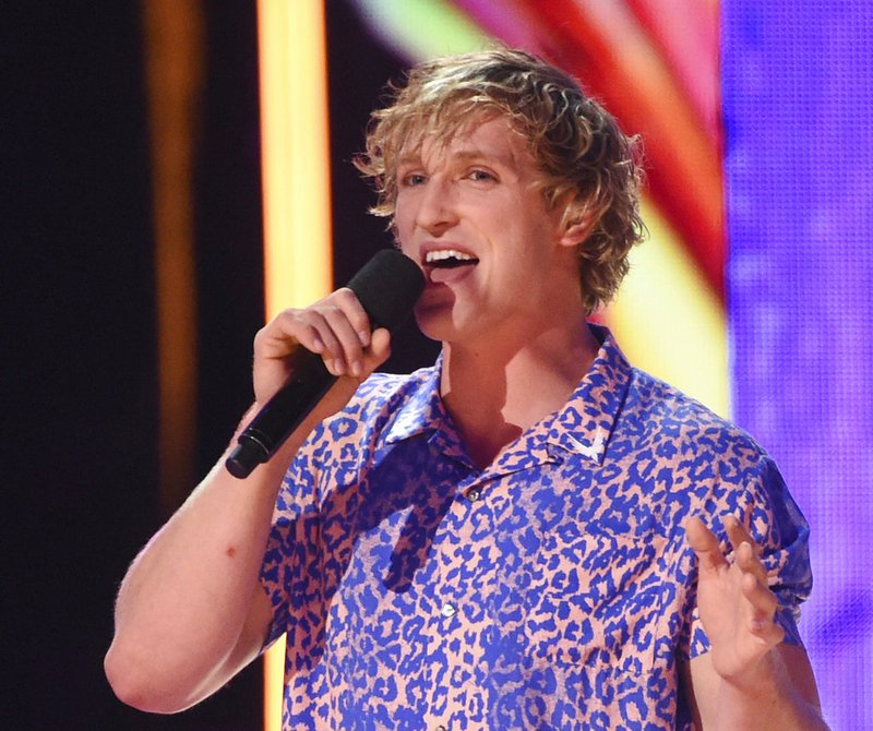 FILE - In this Aug. 13, 2017 file photo, Logan Paul speaks at the Teen Choice Awards at the Galen Center in Los Angeles. YouTube has temporarily suspended all ads from Paul’s channels after what it calls a pattern of behavior unsuitable for advertisers. An email sent to Paul’s merchandise company for comment was not immediately answered Friday, Feb. 9, 2018. 