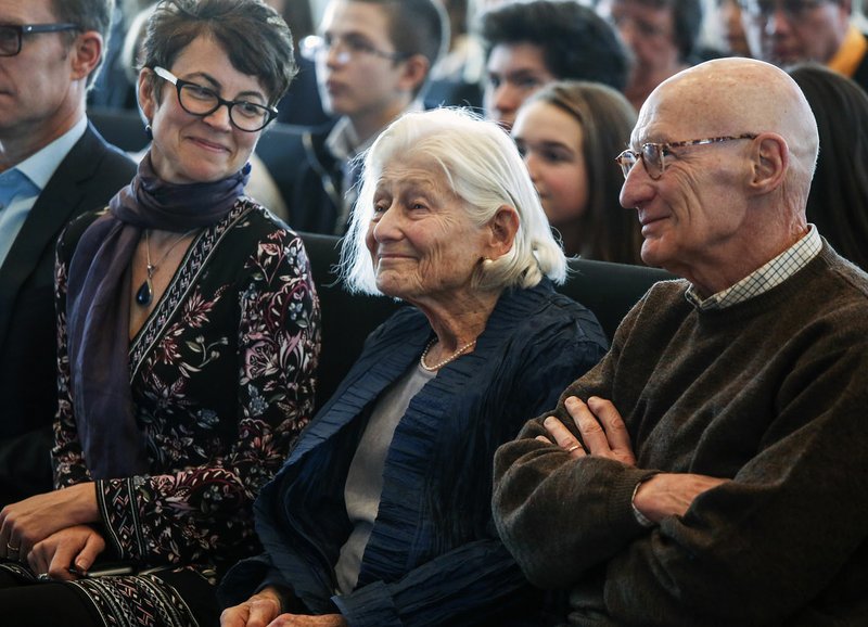 Irene Butter (center), seated with John Bidwell and Kris Holloway (left), co-authors of her book Shores Beyond Shores: From Holocaust to Hope, and friend Paul Bash of Little Rock, listens to a compliment from an audience member after giving a talk at the Clinton Presidential Center on Jan. 31.