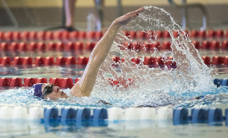 Fayetteville High School’s Olivia Keith competes in the girls 200-yard individual medley Friday during the North District Swimming Championships at the Bentonville Community Center in Bentonville.