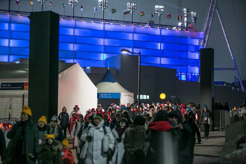 Attendees leave the Pyeongchang Olympic Plaza following the opening ceremony at the 2018 Winter Olympic Games in Pyeongchang, South Korea, on Friday. MUST CREDIT: Bloomberg photo by Jean Chung