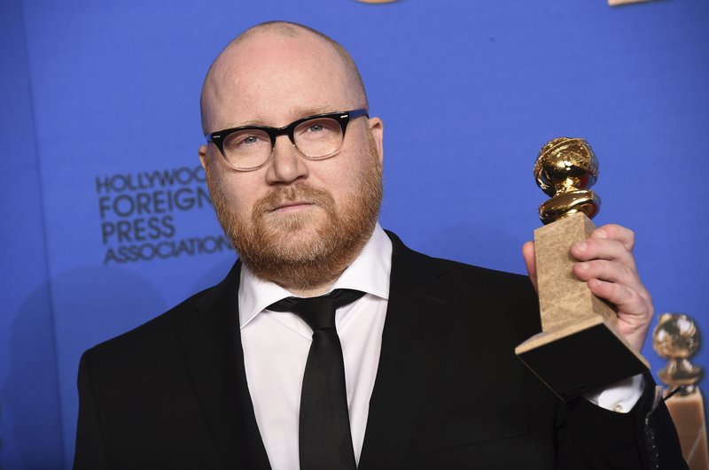 In this Jan. 11, 2015 file photo, Johann Johannsson poses in the press room with the award for best original score for "The Theory of Everything" at the 72nd annual Golden Globe Awards at the Beverly Hilton Hotel in Beverly Hills, Calif. The award-winning musician and film composer has died according to his manager, Tim Husom. Husom says Johannsson died Friday, Feb. 9, 2018 in Berlin. ( Photo by Jordan Strauss/Invision/AP, File)