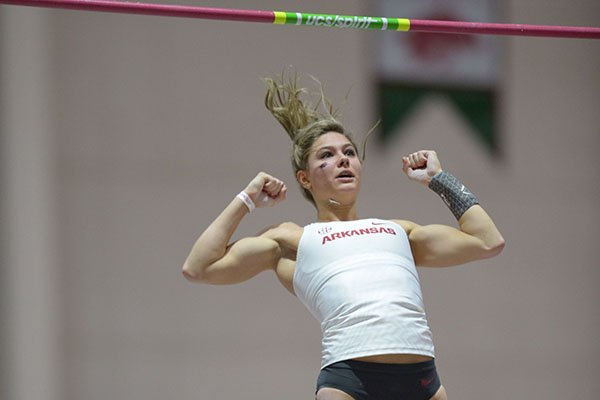 Arkansas' Lexi Jacobus competes in the pole vault invitational Saturday, Feb. 10, 2018, during the Tyson Invitational in the Randal Tyson Track Center in Fayetteville.