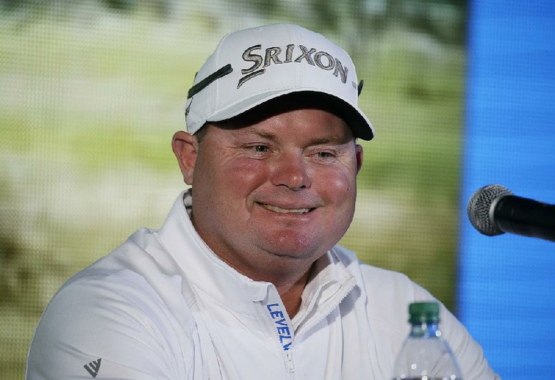 Ted Potter Jr. answers questions after finishing the third round of the AT&T Pebble Beach National Pro-Am golf tournament Saturday, Feb. 10, 2018, in Pebble Beach, Calif. Potter Jr. shot a 9-under-par 62 on the Monterey Peninsula Country Club Shore Course. (AP Photo/Eric Risberg)