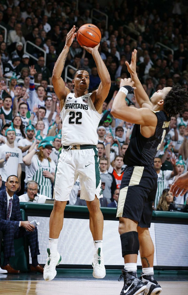 Michigan State’s Miles Bridges (22) scored 20 points and made the game-winning three-pointer with 2.7 seconds left to lift the No. 4 Spartans to a 68-65 victory over No. 3 Purdue.