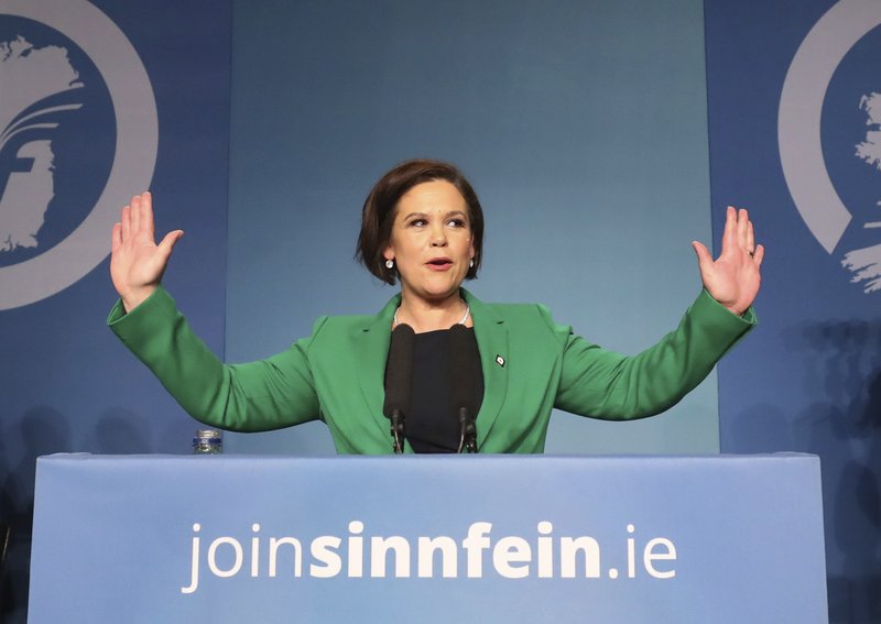 Mary Lou McDonald acknowledges the applause of delegates after she was elected as Sinn Fein's president at the party's special conference at the RDS in Dublin, Ireland, Saturday Feb. 10, 2017. Gerry Adams&#x2019; three decades at the helm of the Sinn Fein party have come to an end with Mary Lou McDonald taking over as leader. McDonald, the first woman to lead the party, is also the first Sinn Fein leader with no direct connection to Ireland&#x2019;s period of violence known as the Troubles. (Niall Carson/PA via AP)