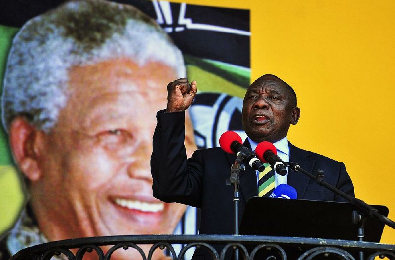 South African Deputy President and African National Congress party President Cyril Ramaphosa delivers a speech at the Grand Parade on Sunday in Cape Town, South Africa, celebrating the 28th anniversary of Nelson Mandela’s release from prison.