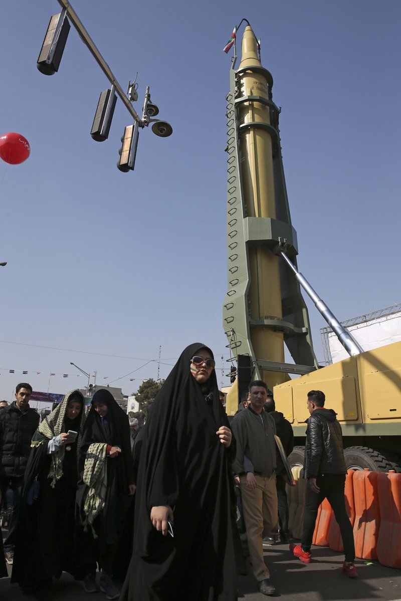 A surface-to-surface missile is displayed by Iranian Revolutionary Guard during a rally marking the 39th anniversary of the 1979 Islamic Revolution, in Tehran, Iran, Sunday, Feb. 11, 2018. Hundreds of thousands rallied on the streets Sunday to mark the anniversary, just weeks after anti-government protests rocked cities across the country. (AP Photo/Vahid Salemi)