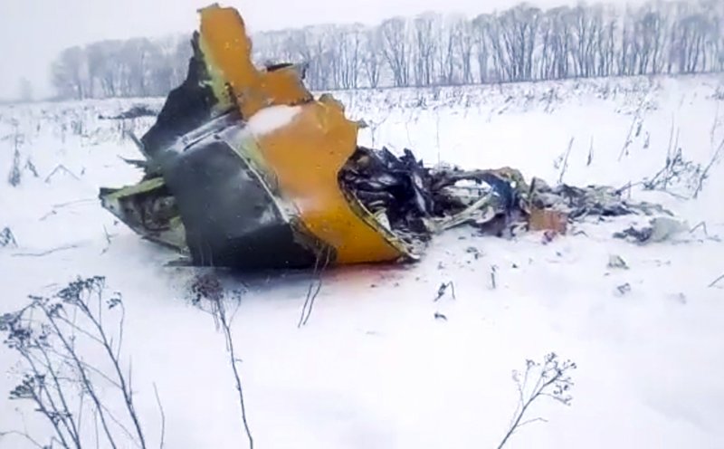 In this screen grab provided by the Life.ru, the wreckage of a AN-148 plane is seen in Stepanovskoye village, about 40 kilometers (25 miles) from the Domodedovo airport, Russia, Sunday, Feb. 11, 2018. Russia's Emergencies Ministry says a passenger plane has crashed near Moscow and fragments of it have been found. (Life.ru via AP)