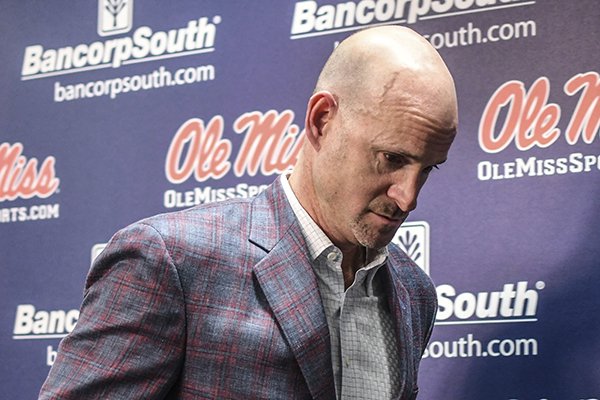 Mississippi head coach Andy Kennedy leaves a press conference at the Pavilion at Ole Miss in Oxford, Miss. on Monday, Feb. 12, 2018. Kennedy, in his 12th season as Mississippi head coach, announced he would not return as coach following this season. (Bruce Newman, Oxford Eagle via AP)