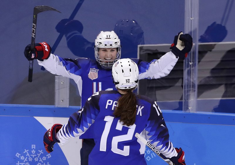 Jocelyne Lamoureux-Davidson (17), of the United States, celebrates her second goal against the team from Russia with Kelly Pannek (12) during the second period of the preliminary round of the women's hockey game at the 2018 Winter Olympics in Gangneung, South Korea, Tuesday, Feb. 13, 2018. (AP Photo/Frank Franklin II)

