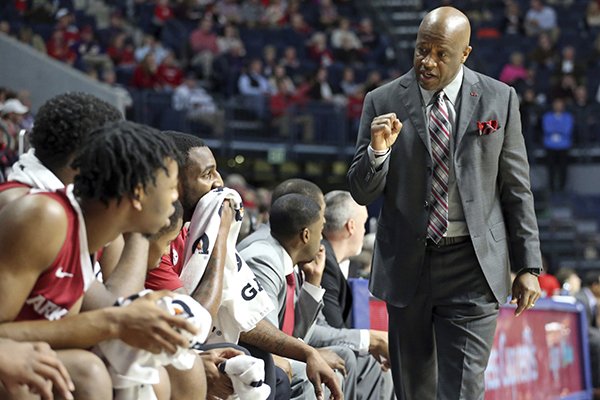 Arkansas forward Mike Anderson celebrates talks to players during the team's NCAA college basketball game against Mississippi in Oxford, Miss., Tuesday, Feb. 13, 2018. (Petre Thomas/The Oxford Eagle via AP)

