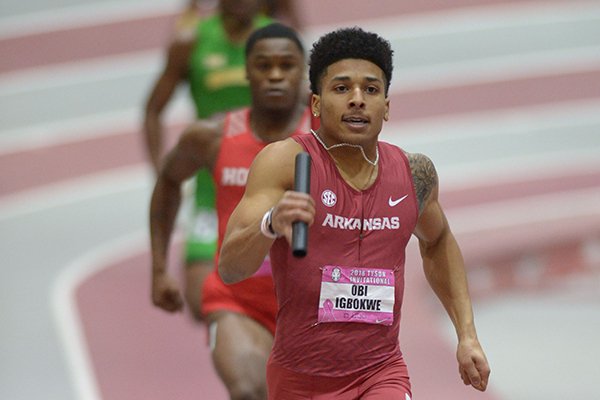 Arkansas' Obi Igbokwe competes in the 4x400-meter relay Saturday, Feb. 10, 2018, during the Tyson Invitational in the Randal Tyson Track Center in Fayetteville.
