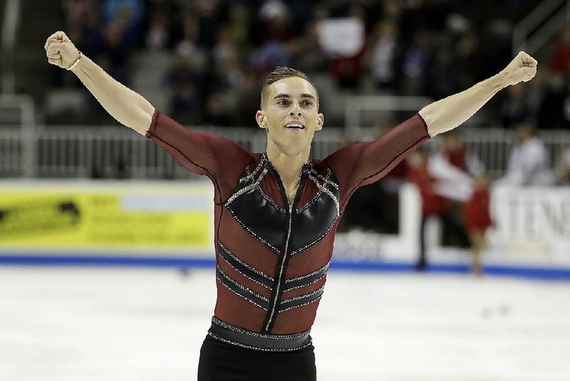 In this Jan. 4, 2018, file photo, Adam Rippon performs during the men's short program at the U.S. Figure Skating Championships in San Jose, Calif. 