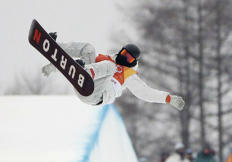 Shaun White of the United States performs a jump during the men’s halfpipe finals at Phoenix Snow Park in Pyeongchang, South Korea. It’s White’s third gold medal — his first since 2010 — and the 100th gold medal the United States has won at the Winter Olympics. 