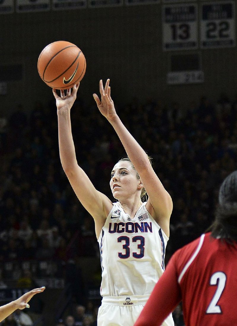 Katie Lou Samuelson (33) scored 26 points to lead No. 1 Connecticut to a 69-58 victory over No. 4 Louisville on Monday night.