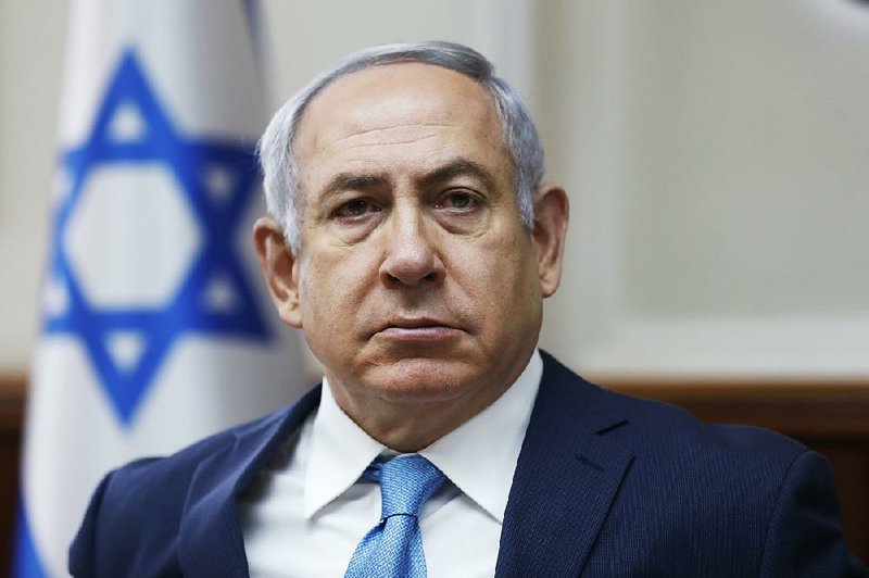 Israeli Prime Minister Benjamin Netanyahu chairs the weekly cabinet meeting at the Prime Minister's office in Jerusalem, Sunday, Feb. 11, 2018. 