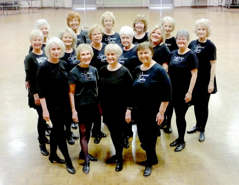 Lynn Atkins/The Weekly Vista The Sophisticated Ladies, a dance group, is planning its first show since 2013. The script of "Bella Vista -- The Musical" was written by members of the company. The dancers are Deb Fullerton (front, left), Helen Bladon, Ann Albitz, Kathy Fidler, Ceata Oberhofer (row two, left), Diane Turner, Donna Vetter, Phyllis Selvia, Pam Benson, Hope Allen, Karen Myers (back, left), Rosalie Dragland, Gail Hobson, Ellen Creakbaum, Pat Walker and director Carol Roller.