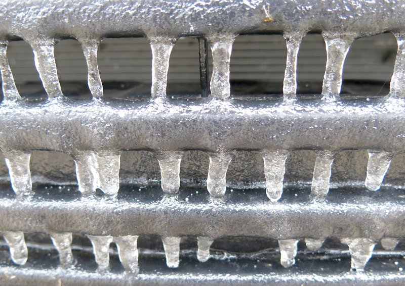Westside Eagle Observer/RANDY MOLL Ice covered pretty much everything outside on Sunday morning, including car grills like this one. Freezing drizzle which began on Saturday afternoon and continued into Sunday morning made roads and sidewalks slick and a bit hazardous whether driving or walking.