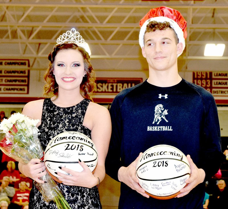 RICK PECK/SPECIAL TO MCDONALD COUNTY PRESS Chloe McCool was crowned queen and Cole DelosSantos was crowned king during McDonald County High School's 2018 basketball homecoming ceremonies held Feb. 9 at MCHS.