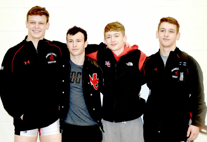 RICK PECK/SPECIAL TO MCDONALD COUNTY PRESS Four McDonald County High School wrestlers earned state tournament berths with a top-four finish at the Missouri Class 3, District 3, Wrestling Tournament held Feb. 9-10 at Carthage High School. Pictured are Timber Teague (left), third, 170; Jakob Gerow, second, 120; Oscar Ortiz, second, 113; and Jack Teague, fourth, 145.