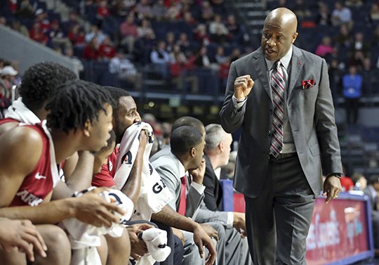 The Associated Press ON POINT: Arkansas men's basketball coach Mike Anderson talks to players Tuesday during the team's 75-64 road SEC win in The Pavilion at Ole Miss. Petre Thomas/The Oxford Eagle.