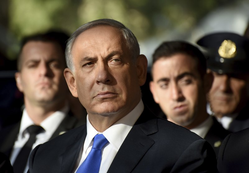 FILE - In this file photo taken on Oct. 26, 2015, Israeli Prime Minister Benjamin Netanyahu attends the official memorial ceremony marking the 20th anniversary of the assassination of the late Prime Minister Yitzhak Rabin in the Mt. Herzl Cemetery in Jerusalem. (Debbie Hill/Pool Photo via AP, File)
