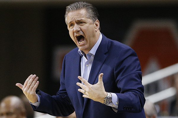 Kentucky head coach John Calipari reacts on the sidelines during the first half of an NCAA college basketball game on Wednesday, Feb. 14, 2018, in Auburn, Ala. (AP Photo/Brynn Anderson)

