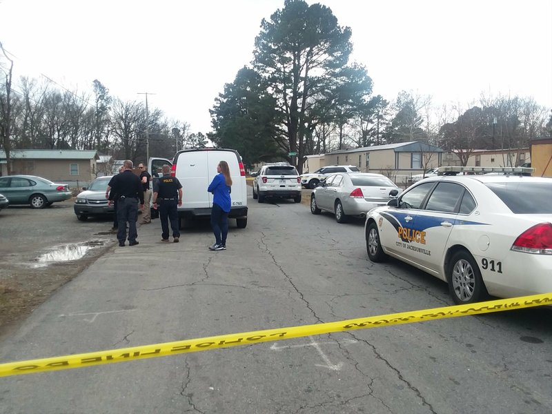 Jacksonville police investigate a possible murder-suicide at a crime scene on Hamilton Street on Thursday, Feb. 15, 2018.