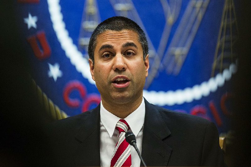 Ajit Pai, chairman of the Federal Communications Commission (FCC), speaks during an open meeting in Washington, D.C., U.S., on Thursday, Nov. 16, 2017. The FCC plans to vote in December to kill the net neutrality rules passed during the Obama era. 