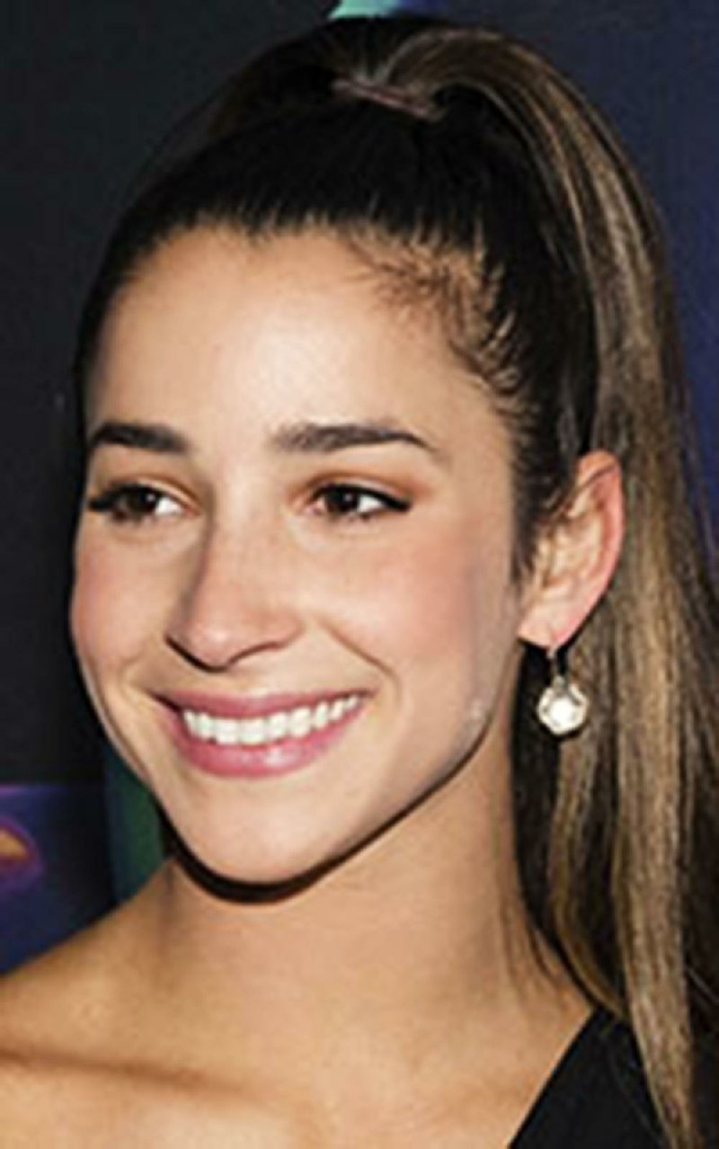 Olympic gold-medal gymnast Aly Raisman arrives at the Directv Super Saturday Night at The Armory on Saturday, Feb. 3, 2018, in Minneapolis.