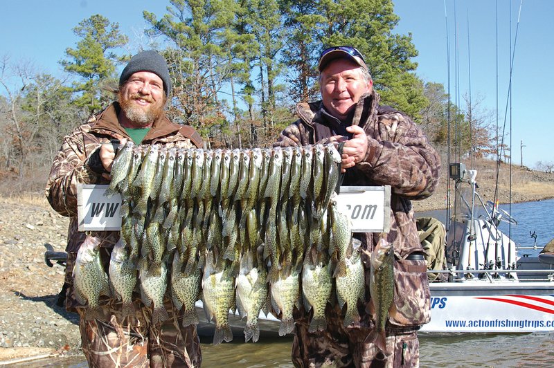 A late-winter fishing trip on DeGray Lake often produces big stringers of good-eating crappie for anglers like Keith Sutton of Alexander, left, and Alex Hinson of Paron.