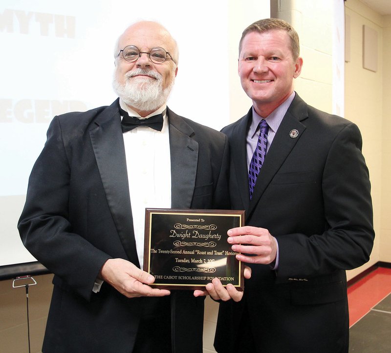 Former Cabot High School teacher Dwight Daugherty, left, is pictured with Cabot School District Superintendent Tony Thurman during the 2017 Cabot Scholarship Foundation Roast & Toast. Daugherty was the roastee for the 22nd annual banquet last year. Daugherty retired following the 2016-17 school year.