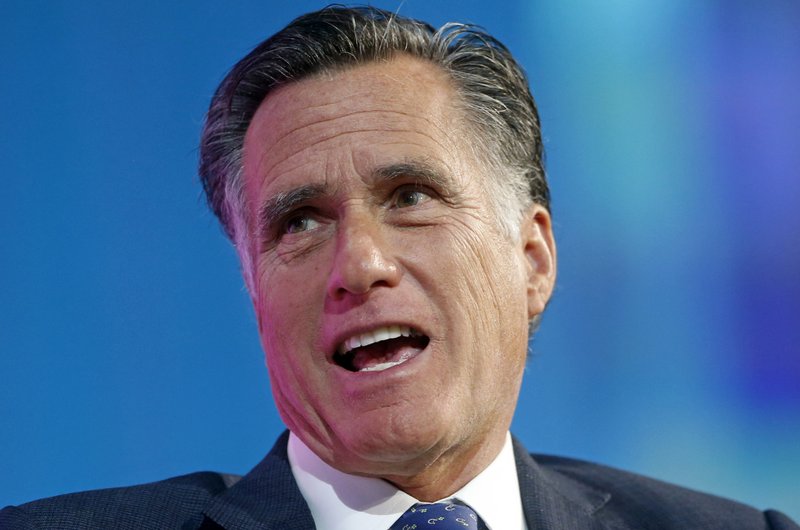 In this Jan. 19, 2018, file photo, former Republican presidential candidate Mitt Romney speaks about the tech sector during an industry conference dubbed Silicon Slopes, the nickname for Utah's burgeoning cluster of tech companies, in Salt Lake City. Romney is trying for a political comeback as he launches a Senate campaign in Utah. 