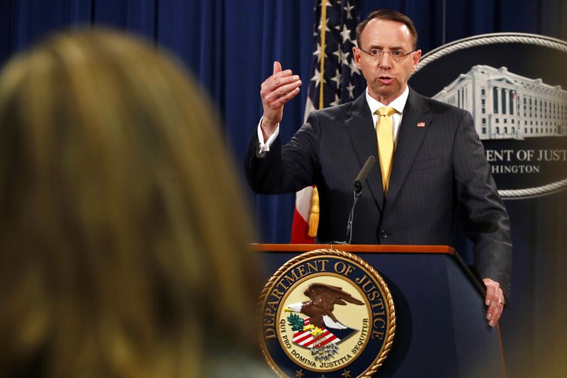 Deputy Attorney General Rod Rosenstein answers a question after announcing that the office of special counsel Robert Mueller announced a grand jury has charged 13 Russian nationals and several Russian entities Friday, Feb. 16, 2018, in Washington. 