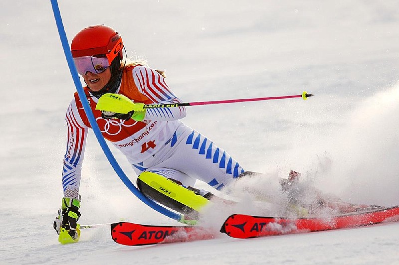 Mikaela Shiffrin of the United States competes during the first run of the women’s slalom Friday at the 2018 Winter Olympics in Pyeongchang, South Korea. Shiffrin earned a come-from-behind victory in the giant slalom Thursday, four years after she finished fifth in the event in Sochi. 