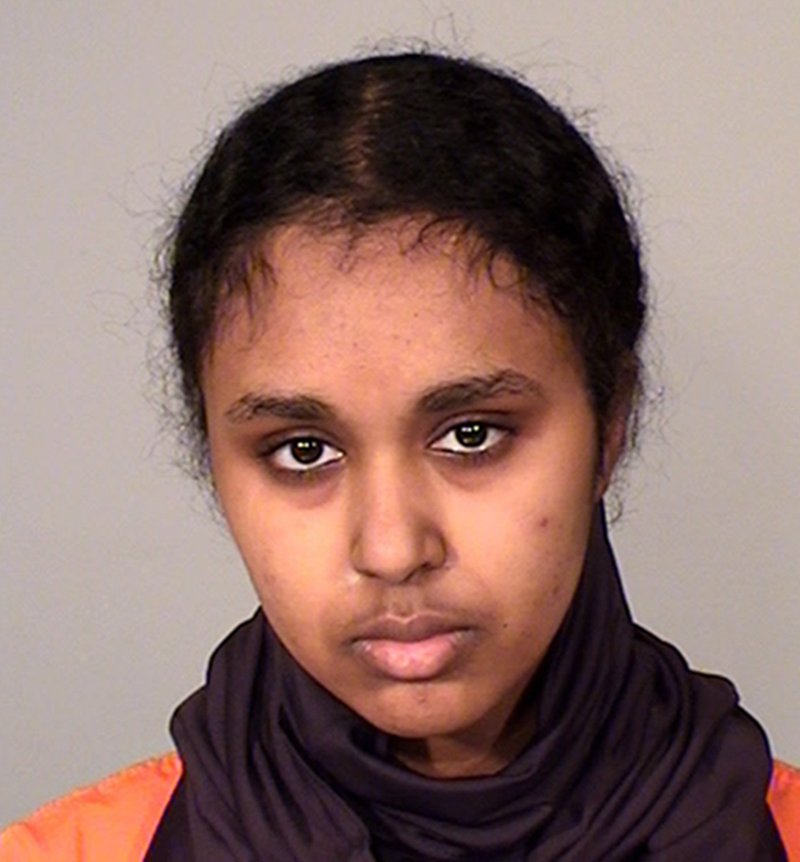 This file photo provided by the Ramsey County Sheriff's Office in St. Paul, Minn., shows Tnuza Jamal Hassan, of Minnesota. Hassan, who authorities say had hoped to kill people when she set fires in January 2018 on a college campus, has been ordered detained by a federal judge. Hassan pleaded not guilty Monday, Feb. 12, 2018, to federal counts of attempting to provide material support to al-Qaida, lying to the FBI and arson. (Ramsey County Sheriff's Office via AP, File)