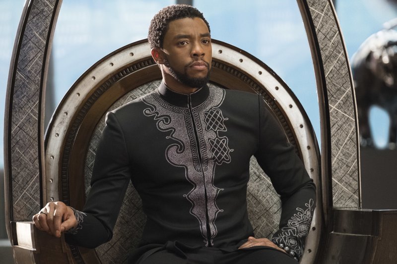 This image released by Disney shows Chadwick Boseman in a scene from Marvel Studios' "Black Panther." The Walt Disney Co. estimated Saturday, Feb. 17, 2018, the Marvel Comics superhero movie earned $75.8 million domestically for its opening Friday, the eighth biggest day in industry history. (Matt Kennedy/Marvel Studios-Disney via AP)