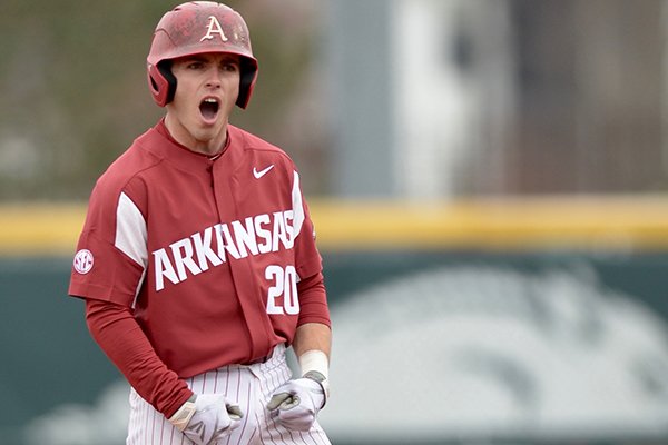 Arkansas second baseman Carson Shaddy reacts after hitting a three-run double during the third inning of a game against Bucknell on Saturday, Feb. 17, 2018, in Fayetteville. 
