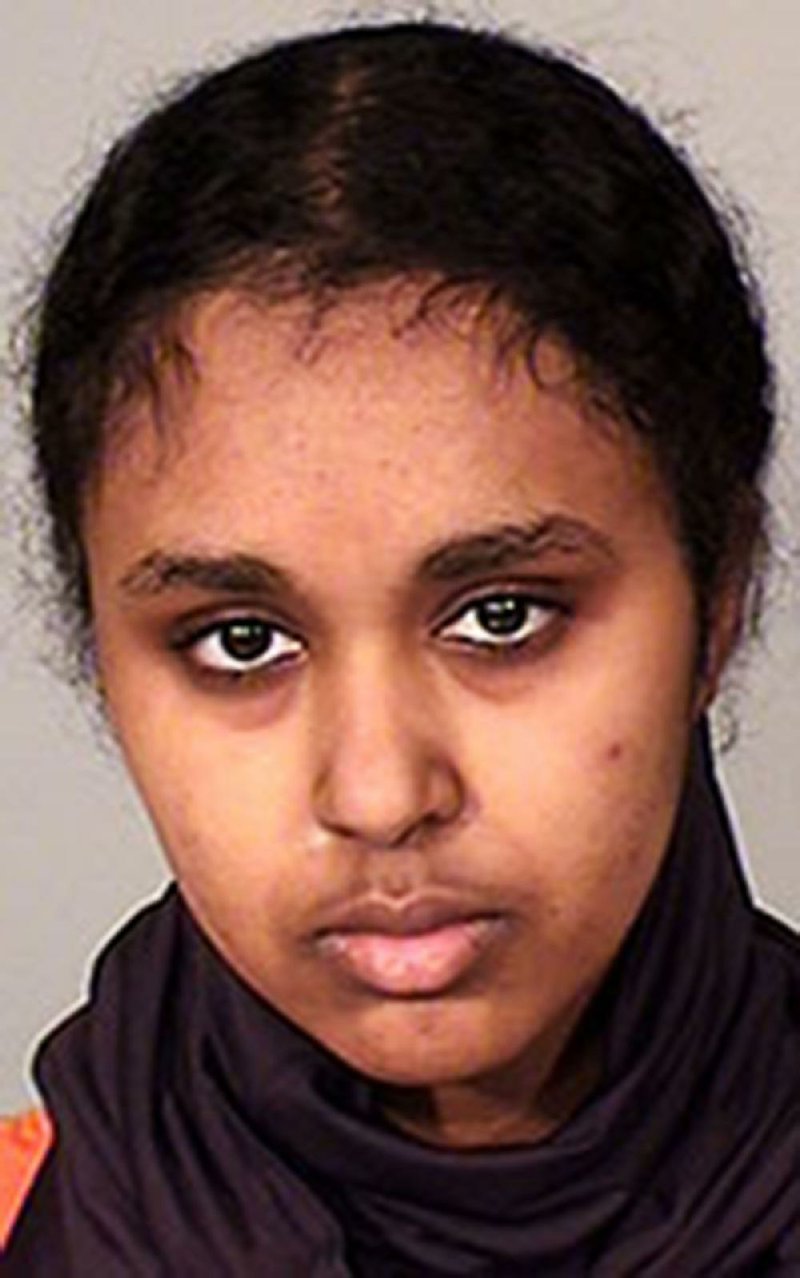 This file photo provided by the Ramsey County Sheriff's Office in St. Paul, Minn., shows Tnuza Jamal Hassan, of Minnesota. Hassan, who authorities say had hoped to kill people when she set fires in January 2018 on a college campus, has been ordered detained by a federal judge. Hassan pleaded not guilty Monday, Feb. 12, 2018, to federal counts of attempting to provide material support to al-Qaida, lying to the FBI and arson. (Ramsey County Sheriff's Office via AP, File)