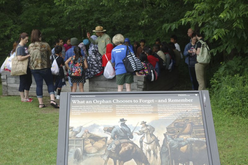 Courtesy Photo Park ranger Curtis Gregory leads a group of visitors to the George Washington Carver National Monument in Diamond, Mo. Gregory, who grew up in West Virginia, says he always wanted to be a park ranger at a park dedicated to African-American history.