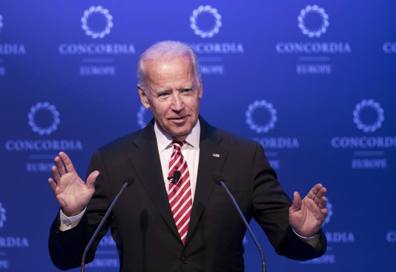 FILE- In this June 7, 2017, file photo, former U.S. Vice President Joe Biden speaks during a conference in Athens. Biden is tiptoeing toward a potential run in 2020, even broaching the possibility during a recent gathering of longtime foreign policy aides. Huddled his newly opened office steps from the U.S. Capitol, Biden opened a planning meeting for his new diplomacy center by addressing the elephant in the room. He said he was keeping his 2020 options open, considering it a real possibility.  (AP Photo/Petros Giannakouris, File)