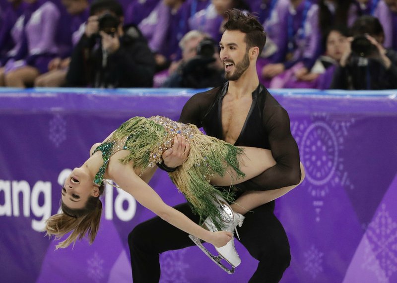 Gabriella Papadakis and Guillaume Cizeron of France perform during the ice dance, short dance figure skating in the Gangneung Ice Arena at the 2018 Winter Olympics in Gangneung, South Korea, Monday, Feb. 19, 2018. 