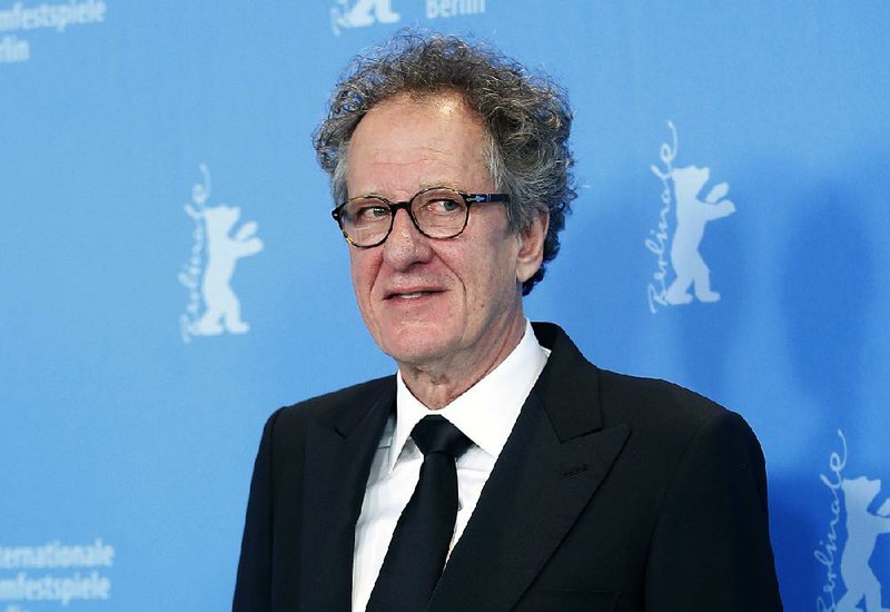 In this Tuesday, Feb. 12, 2013 file photo, actor Geoffrey Rush poses at the photo call for the film The Best Offer at the 63rd edition of the Berlinale, International Film Festival in Berlin. 