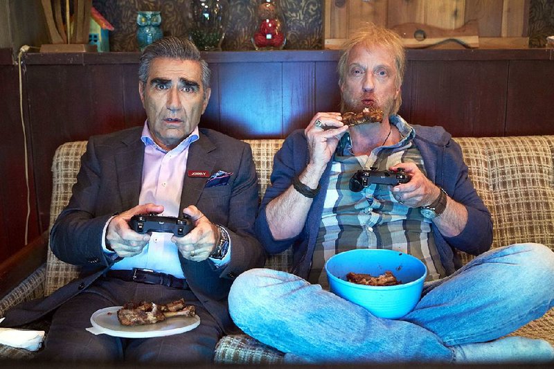 Schitt’s Creek on the Pop cable channel stars Eugene Levy (left) and Chris Elliott. The comedy airs at 7 p.m. Wednesday.
