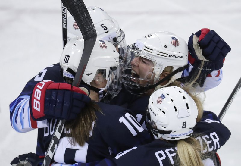 Gigi Marvin (19), of the United States, celebrates with her teammates after scoring a goal against Finland during the first period of the semifinal round of the women's hockey game at the 2018 Winter Olympics in Gangneung, South Korea, Monday, Feb. 19, 2018. (AP Photo/Julio Cortez)