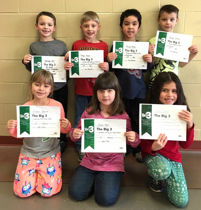 Photo submitted First-grade Big 3 Award winners were presented with certificates at the monthly Round-Up assembly. Students pictured are Tristan Devine (front, left), Grace Ball, Naomi Glover, Korban Hill (back, left), Jayce Hayden, Rydon Parton and Parker Welch.