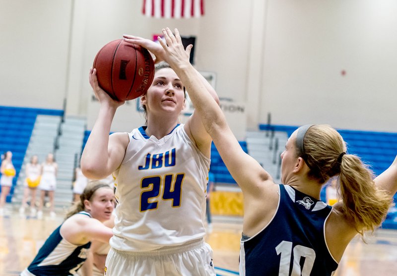 Photo courtesy of JBU Sports Information John Brown junior Baily Cameron scored 13 of her 22 points in the fourth quarter as JBU held on to beat Texas Wesleyan 72-70 on Saturday at Bill George Arena.